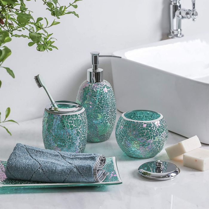 The shimmering blue, green, and purple mosaic set, featuring a toothbrush holder, lotion dispenser, cotton ball jar, and vanity tray!