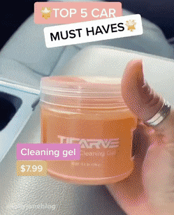 A GIF from a TikTok video demonstrates how cleaning gel clears debris from a car's center console.