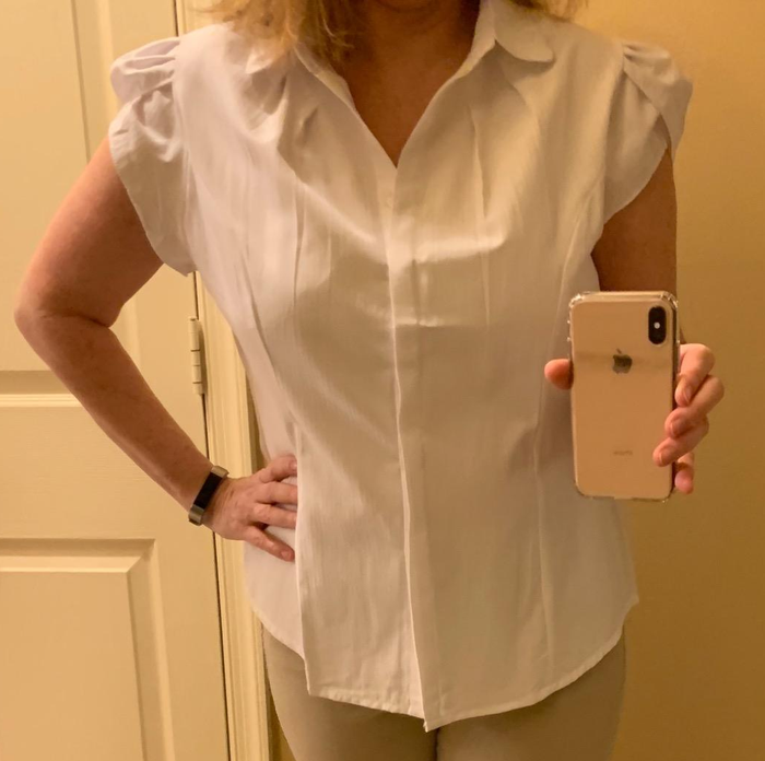 Image of reviewer wearing a white shirt