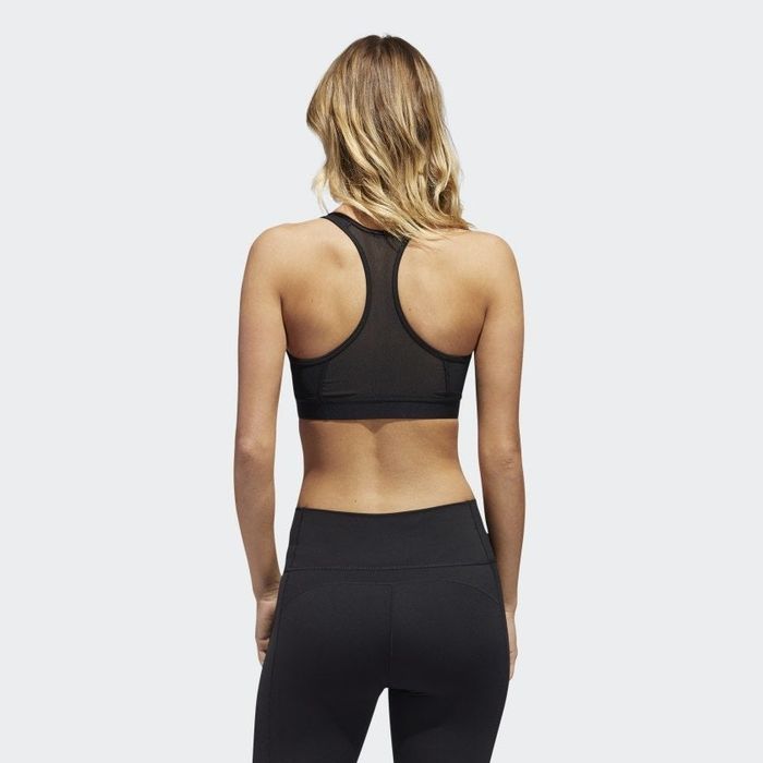 back view of the model wearing the sports bra in black