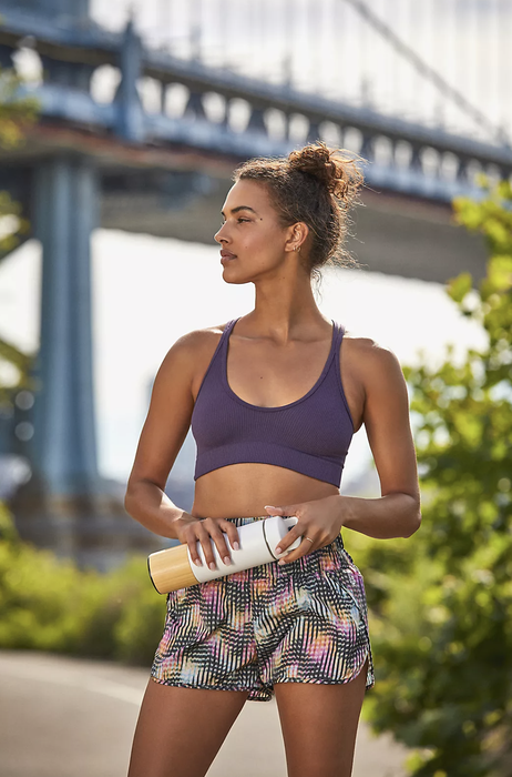 A model demonstrating the purple bra.