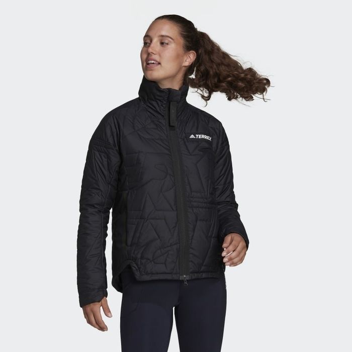 The model is showcasing the black version of the jacket.