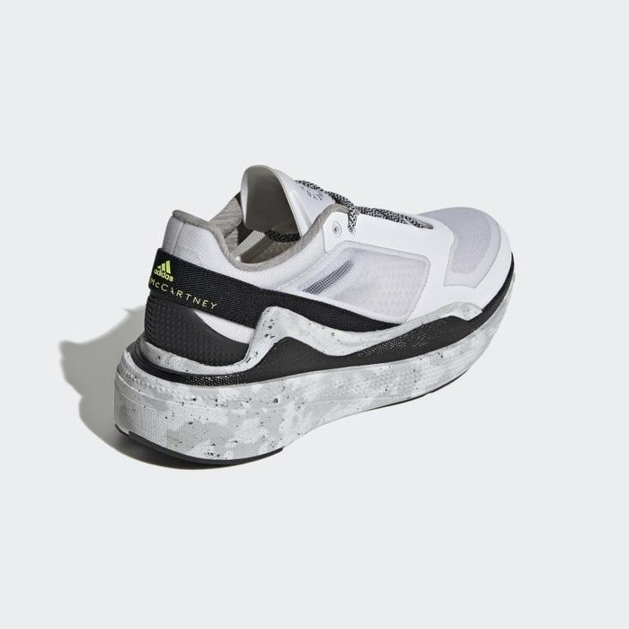A rear view of the shoes in shades of grey and black.
