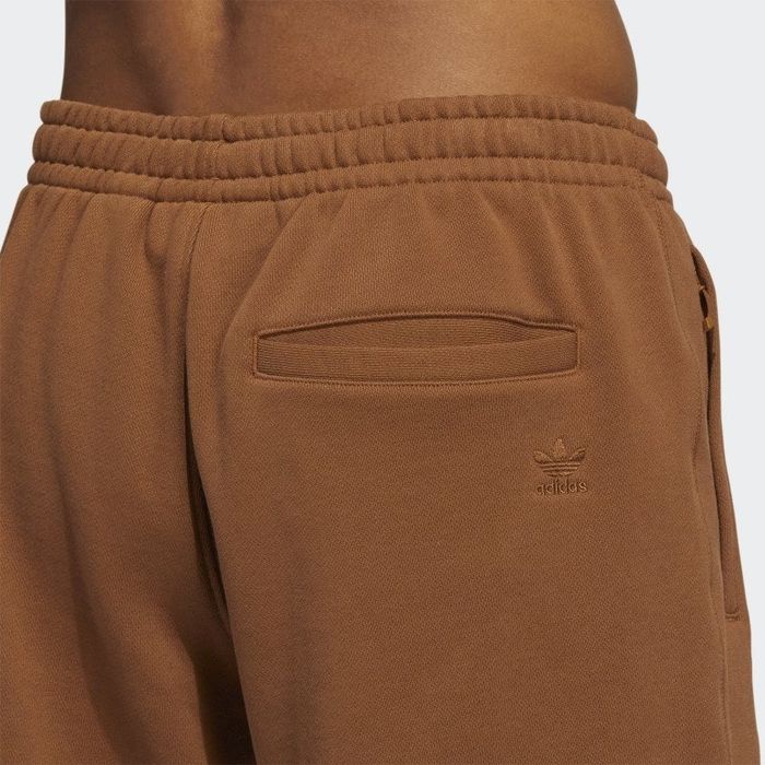 the back pocket with the Adidas logo on the back of the shorts