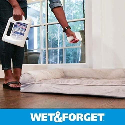 Person disinfecting a pet bed using Wet & Forget spray