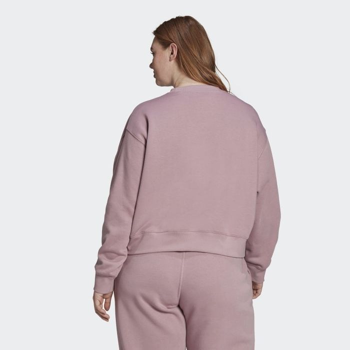 back view of the model showing off the sweater in magic mauve
