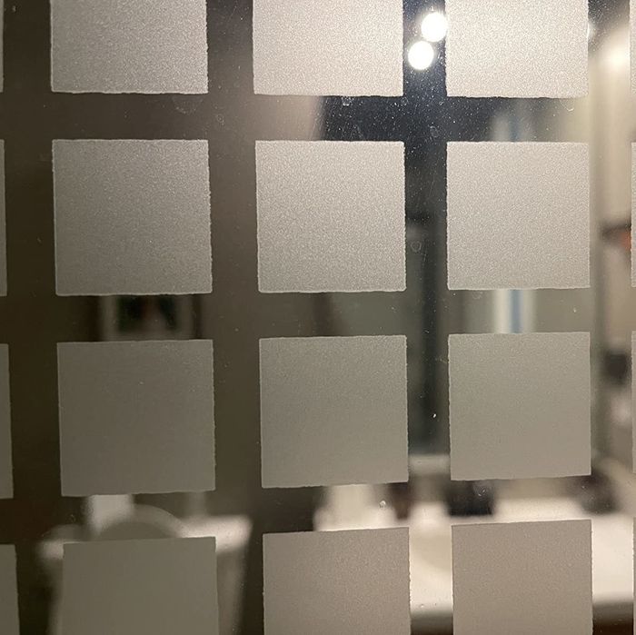 A reviewer photo of the same door now without any hard water stains