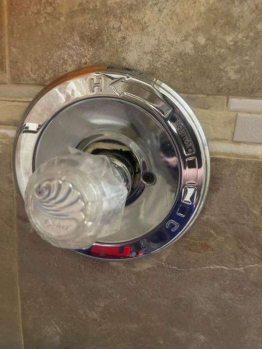 Clear shower faucet handle featuring 