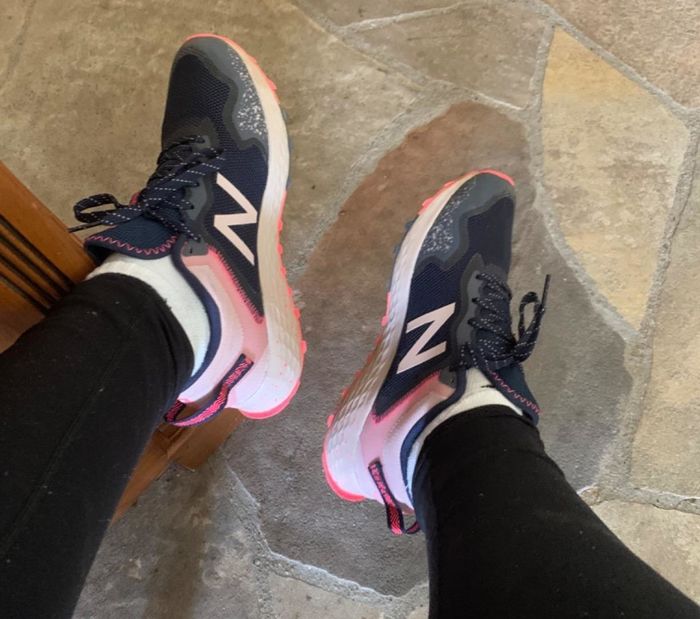 A reviewer sporting the shoes with an