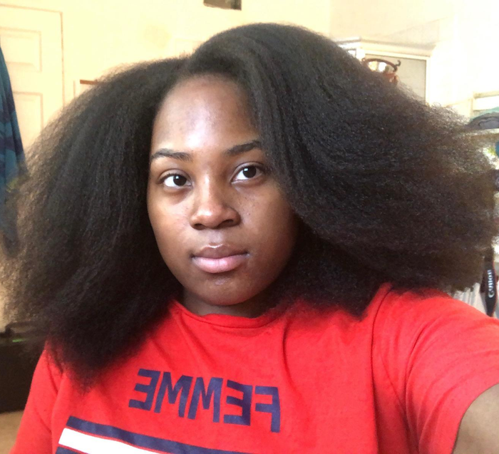 Reviewer with medium-length, straightened hair