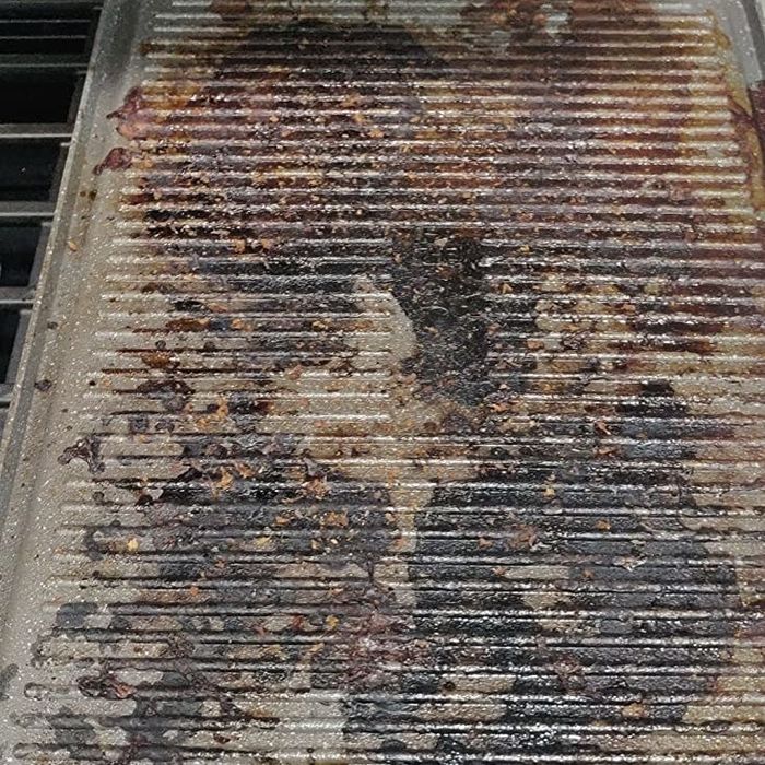 A soiled baking sheet