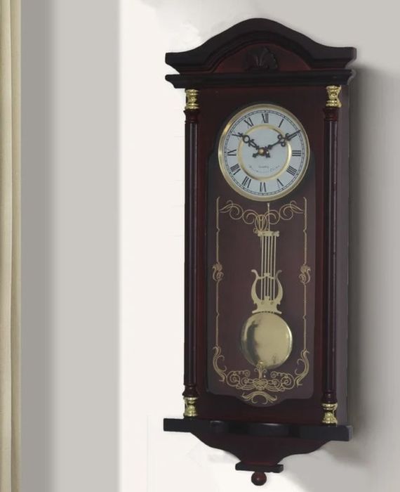 A vintage wooden clock mounted on a wall