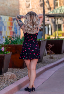reviewer showcasing the dress from the back