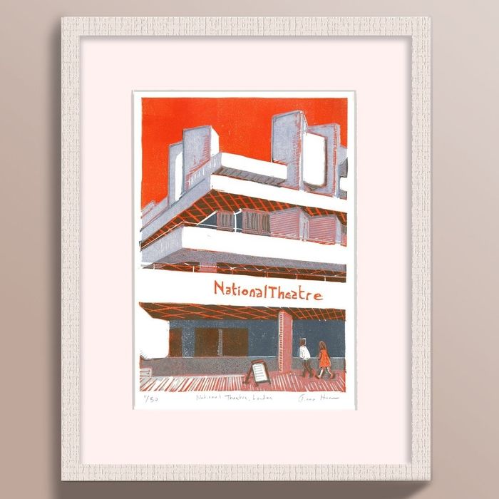 A framed art print of the National Theatre in London, featuring a stylized illustration
