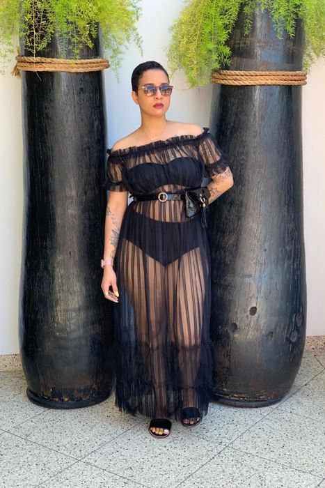 reviewer modeling the black version of the dress
