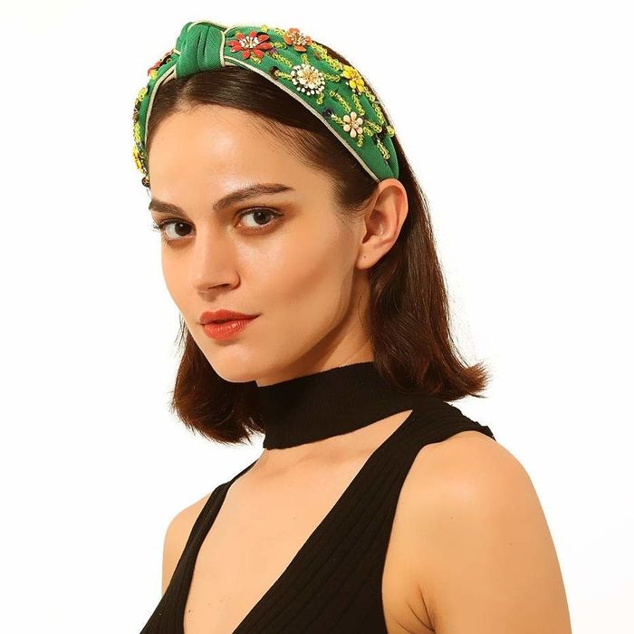 A model sporting the green headband