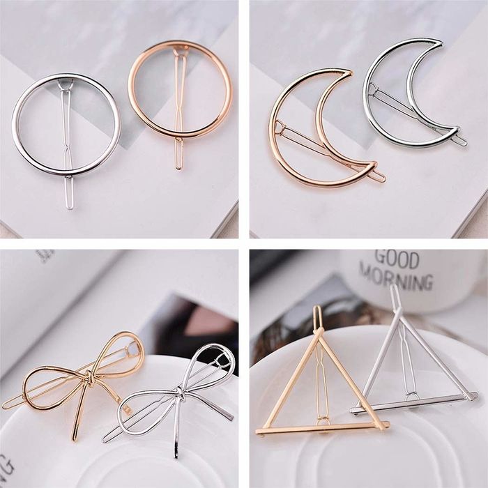 Two clips in each color (one gold, one silver) featuring four distinct shapes: circles, crescent moons, bows, and triangles