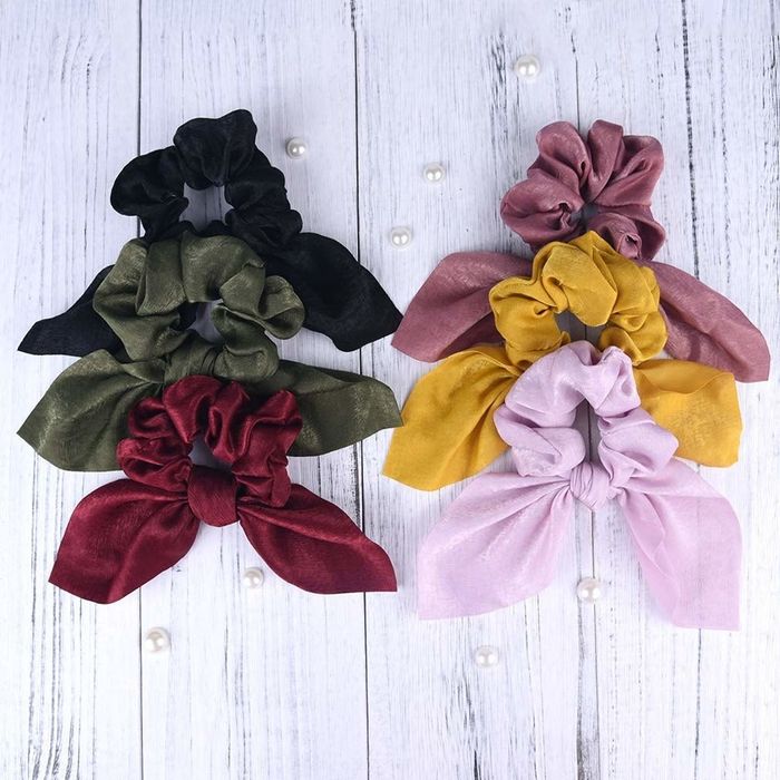 The scrunchies available in black, olive, burgundy, mauve, yellow, and light pink