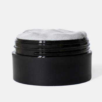 The face mask inside its jar.