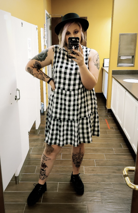 reviewer taking a bathroom selfie while wearing the dress