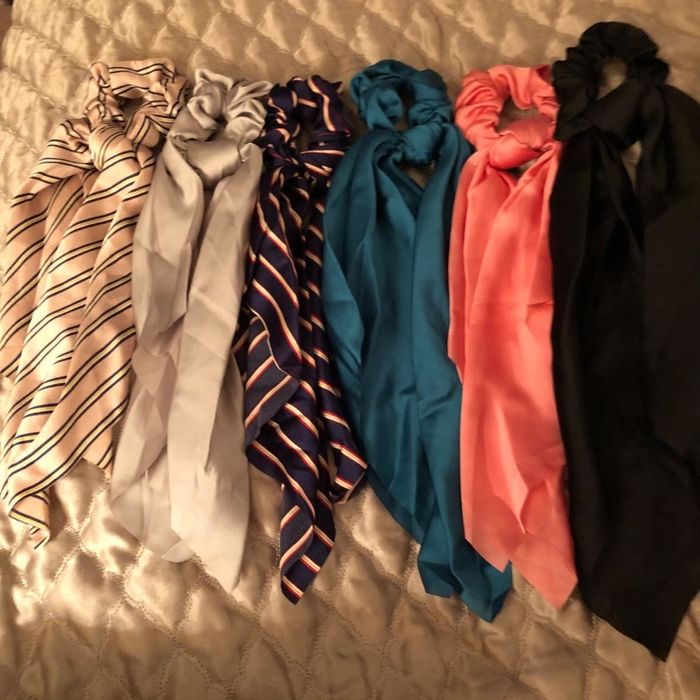 Scrunchies available in various colors including pink stripe, gray, navy stripe, teal, coral, and black