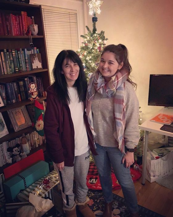 Mytour editor wearing the scarf in blue, red, and white