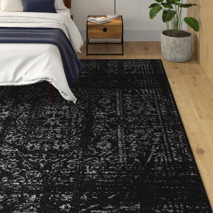 The area rug in a cozy bedroom