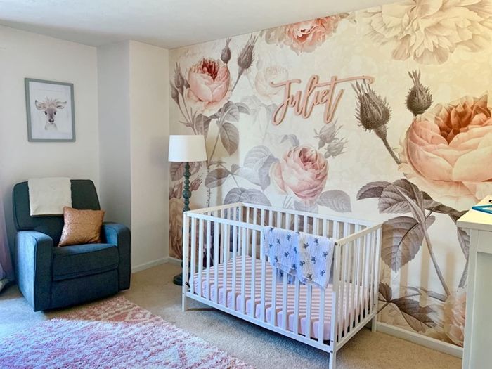 Another reviewer's nursery featuring the mural elegantly placed behind the crib