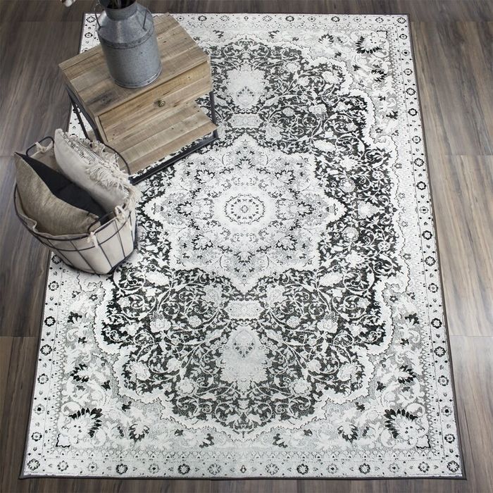The vintage area rug in the living room