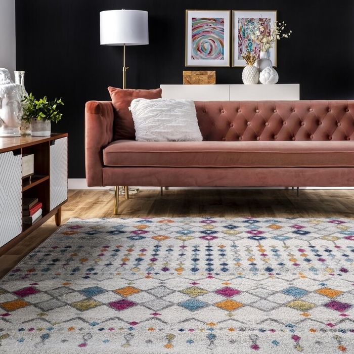 The geometric rug in the living room