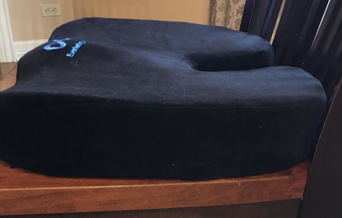 A customer review photo showcasing the side view of the cushion.