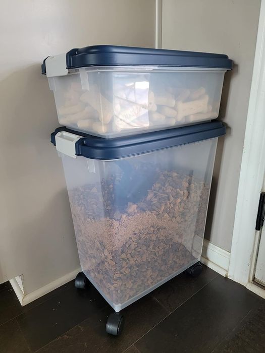 A reviewer demonstrating how the containers can be stacked neatly