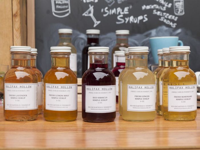 A lineup of simple syrups in various enticing flavors.