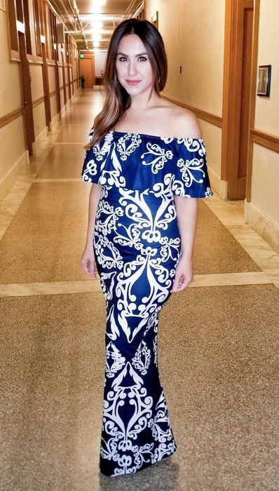 A reviewer praised the elegant dress she wore.