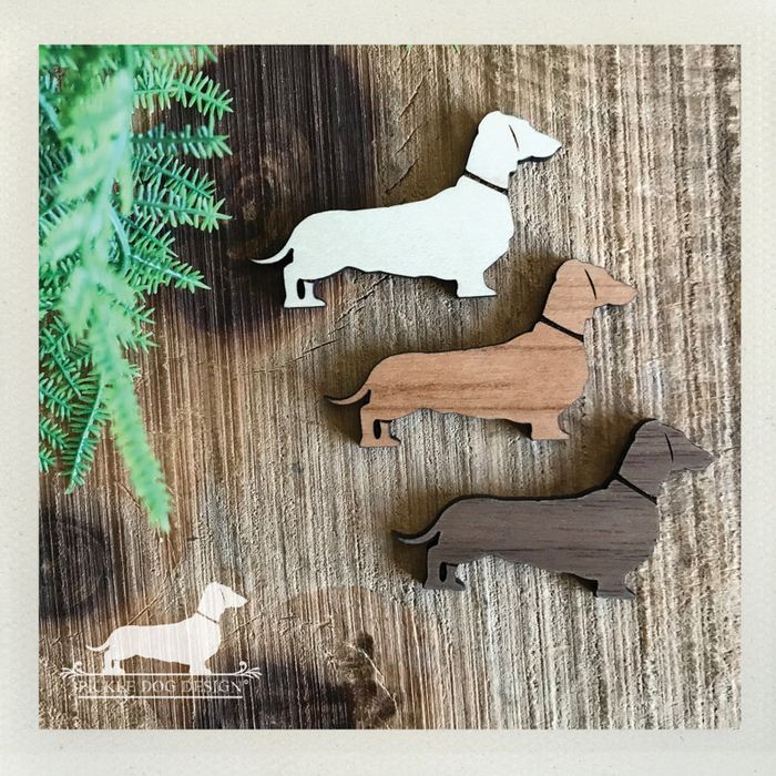 handcrafted wooden dachshund figures