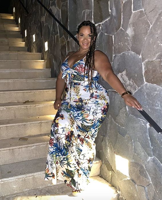 A reviewer showcasing the dress
