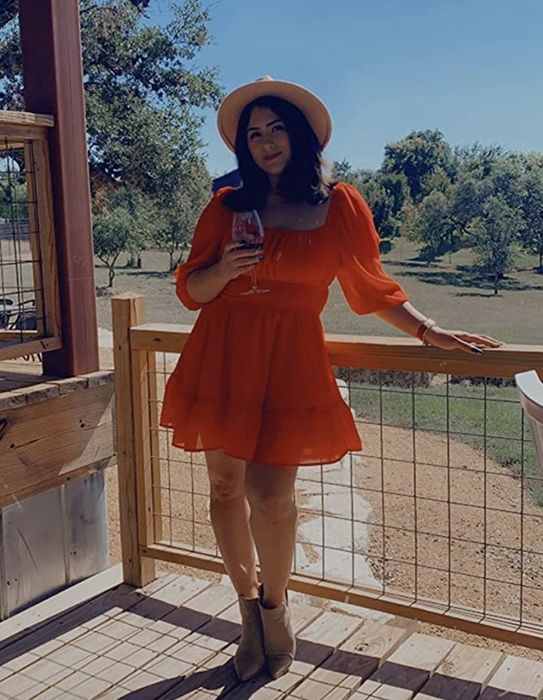 A customer modeling the dress