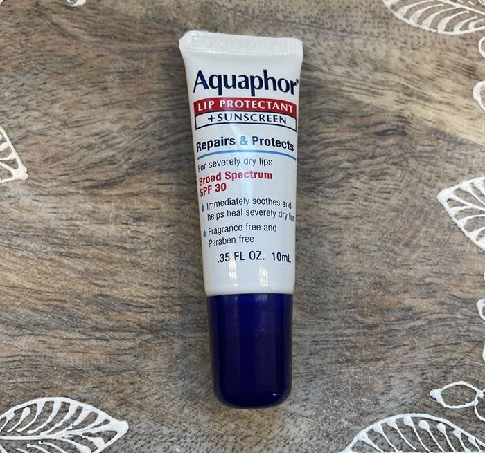 A reviewer’s lip SPF, showing the protective product applied to the lips.