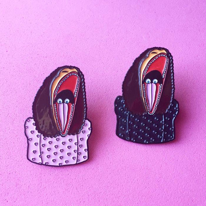 enamel pins depicting Barbara and Adam from 