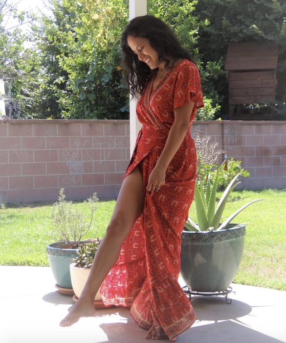 A reviewer wore a red patterned dress.