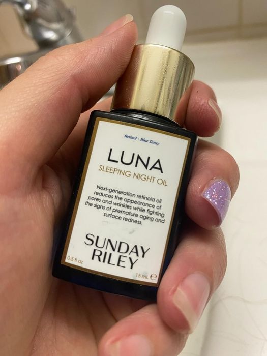 A reviewer's photo showcasing the serum, emphasizing its quality and effectiveness.