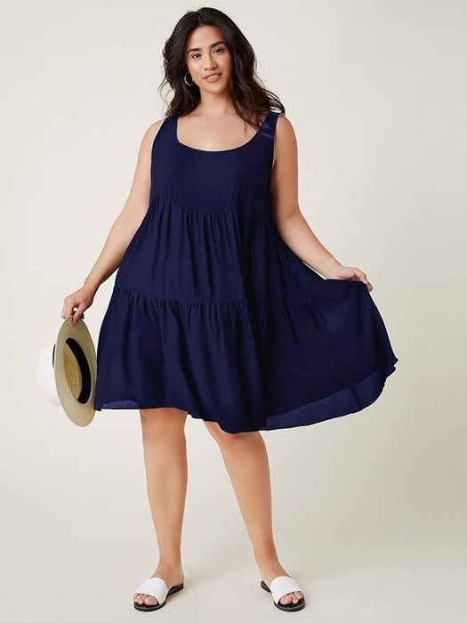 The customer wearing the green dress