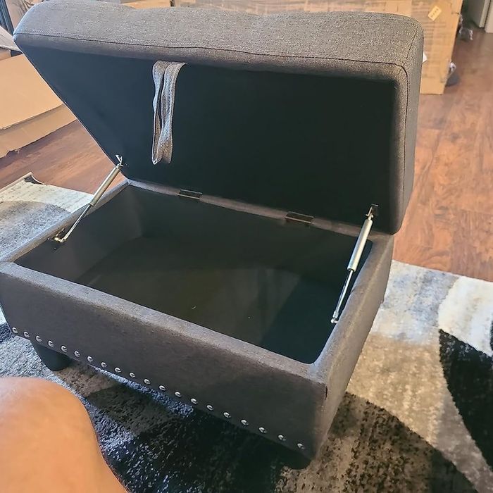 The storage ottoman offers hidden space to keep your living area neat and organized.