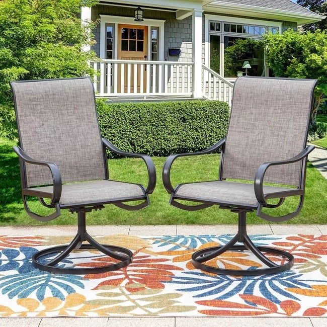 A set of gray and black patio swivel rocking chairs placed on a vibrant outdoor rug.