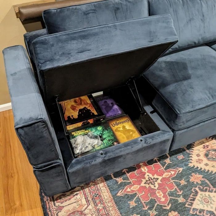This modular sectional features convenient storage space for keeping items out of sight.