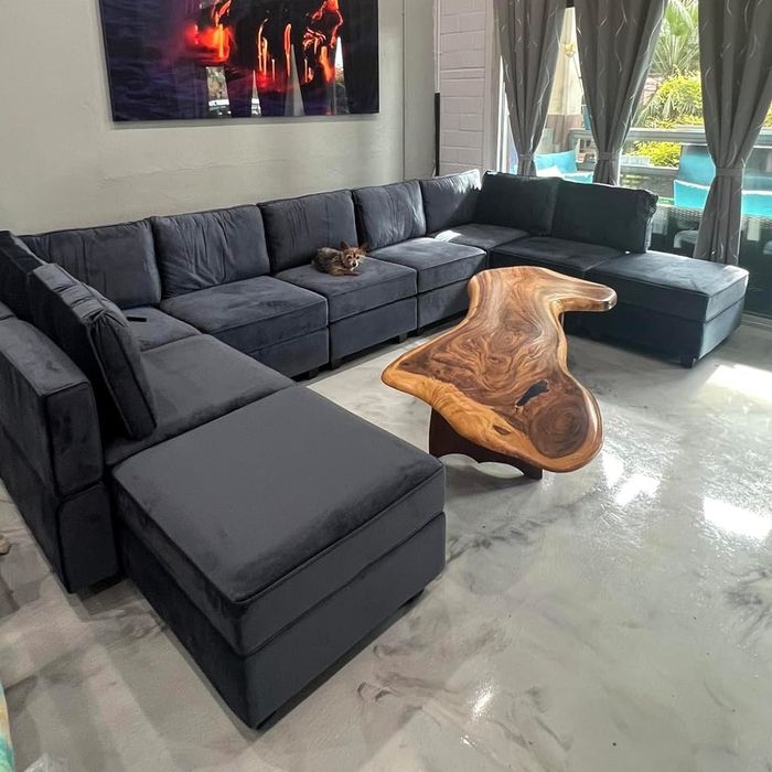 This sectional offers both comfort and practicality, featuring plush cushions and a versatile design.