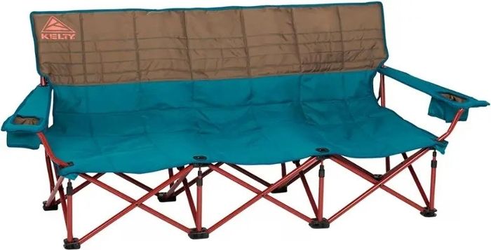 A collapsible outdoor couch by Kelty with built-in cup holders and a robust metal frame, perfect for camping or any outdoor activity.