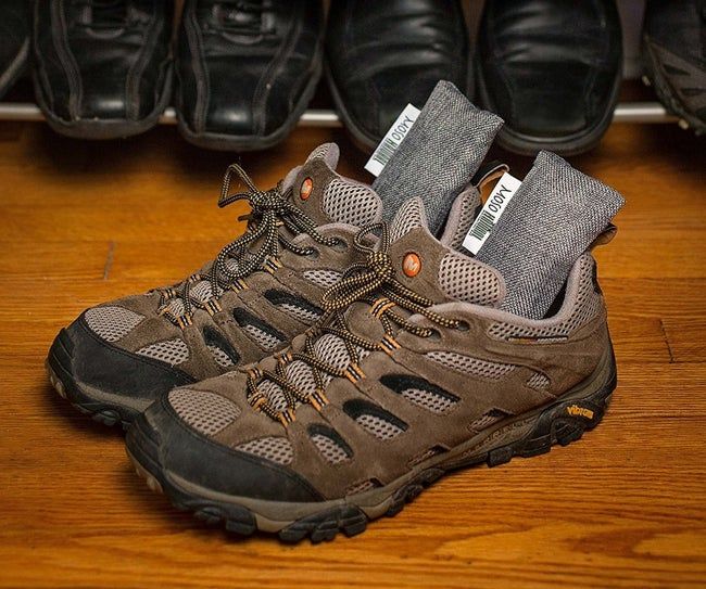 Hiking sneakers featuring bamboo inserts, with additional shoes visible in the background