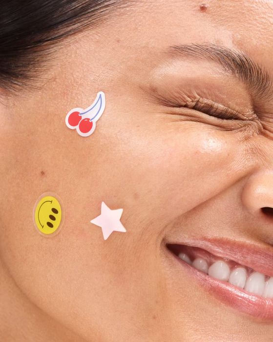 acne patches on model's face