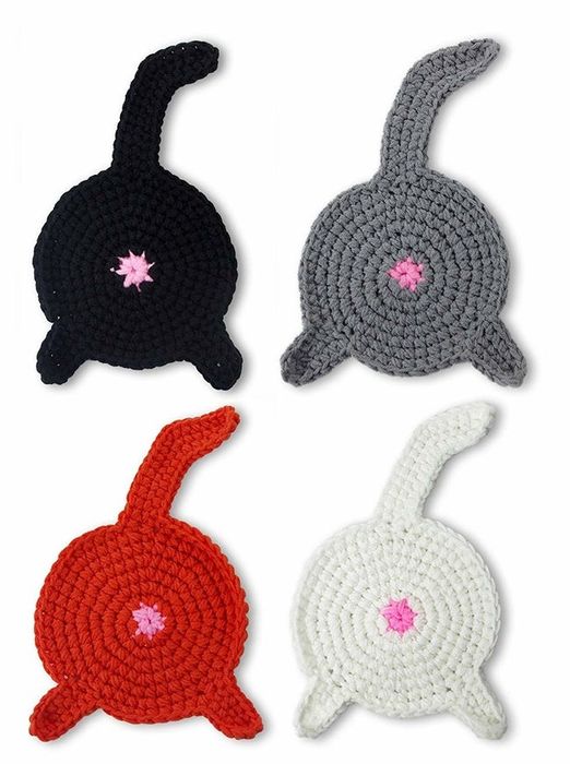 Crochet coasters designed to resemble adorable cat butts.